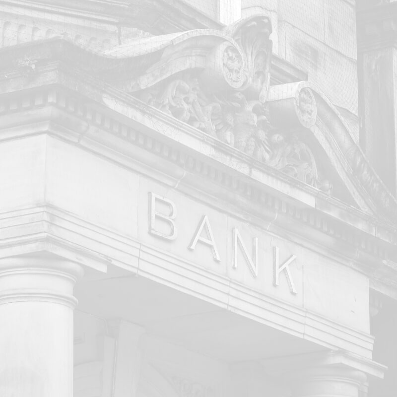 Fassade eines Bankgebäudes mit dem Schriftzug „BANK“.